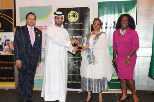 H.E Roman Tesfaye receiving awards from HH Sheikh Juma Bin Maktoum, Patron to the Summit