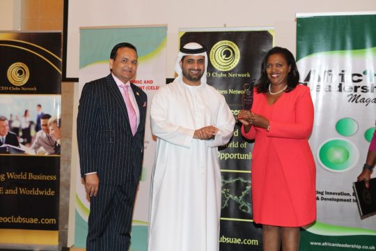 Mrs Tabitha Karanja, CEO of Keroche Breweries, Kenya, displaying her award plaque