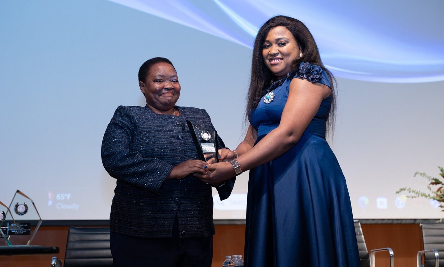 From Right – Left: Dr. Mrs Ibifuro Ken-Giami, Executive Director, CELD & Host of GPWC New York Event  presents the Female Impact Award to Robinah Nabbanja, Prime Minister of Uganda